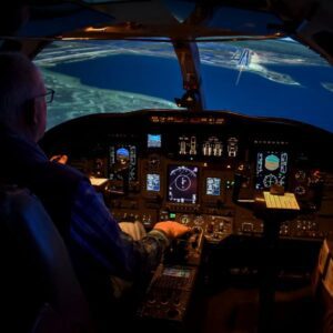 A person earning a type rating in the CE500 simulator