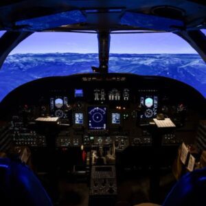 A person flying within a CE500 flight simulator