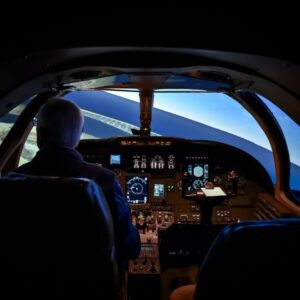 A man inside the full flight simulator